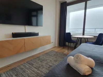 TV/Unterhaltungsangebot in der Unterkunft Penthouse mit einzigartigem Blick über Essen