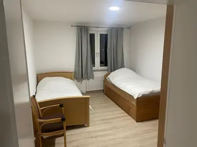 Ein Bett oder Betten in einem Zimmer der Unterkunft Große Apartment mit kostenlosen Parkplätze AVD 2