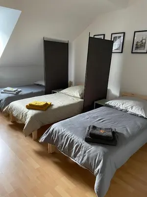 Ein Bett oder Betten in einem Zimmer der Unterkunft SANO - Hagen - Eckesey