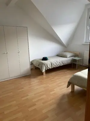 Ein Bett oder Betten in einem Zimmer der Unterkunft SANO - Hagen - Eckesey
