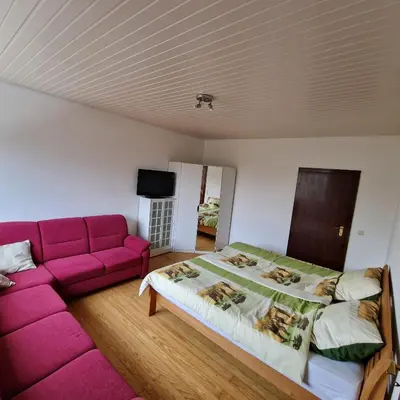 Ein Sitzbereich in der Unterkunft Zuhause im Grünen