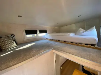 Ein Bett oder Betten in einem Zimmer der Unterkunft Tiny House Stever im PIER9 Tiny House Hotel