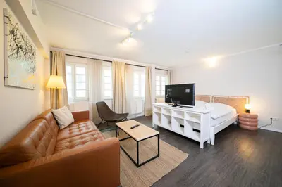 Ein Bett oder Betten in einem Zimmer der Unterkunft Favorite Stays -Suite and More - Altstadt