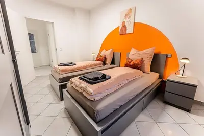 Ein Bett oder Betten in einem Zimmer der Unterkunft Loft mit Billard-Tisch und PS4