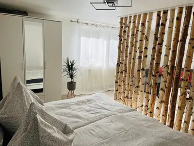 Ein Bett oder Betten in einem Zimmer der Unterkunft Zuhause bei Zampich