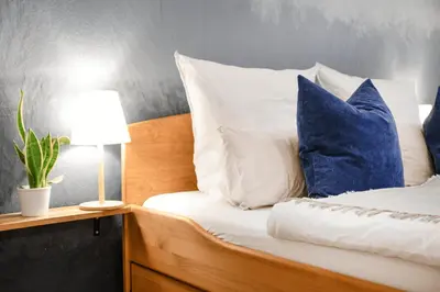 Ein Bett oder Betten in einem Zimmer der Unterkunft FeWo Phönixhütte am Baldeneysee in Kupferdreh