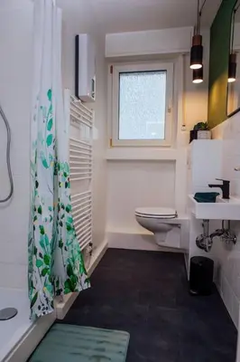 Ein Badezimmer in der Unterkunft Green & Modern - City - Netflix - WiFi - 2 Person