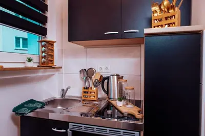 Küche/Küchenzeile in der Unterkunft Green & Modern - City - Netflix - WiFi - 2 Person