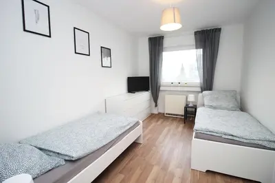 Ein Bett oder Betten in einem Zimmer der Unterkunft Cozy Apartment with Balcony