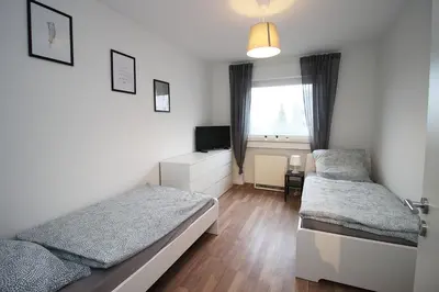 Ein Bett oder Betten in einem Zimmer der Unterkunft Cozy Apartment with Balcony