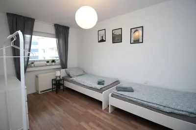 Ein Bett oder Betten in einem Zimmer der Unterkunft Cozy Apartment with Balcony