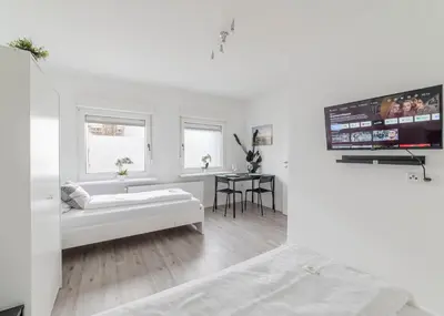 Ein Bett oder Betten in einem Zimmer der Unterkunft VAZ Apartments Haus Walsum Modernes Monteur- & Team-Base WLAN, Küche