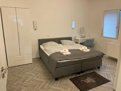 Ein Bett oder Betten in einem Zimmer der Unterkunft Apartment am Grünen Ring