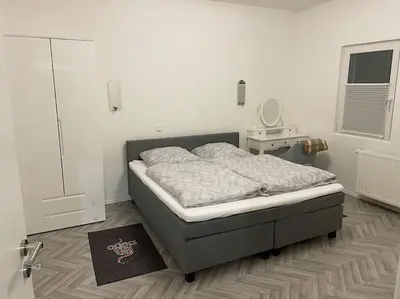 Ein Bett oder Betten in einem Zimmer der Unterkunft Apartment am Grünen Ring