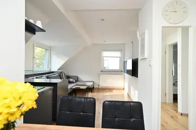 Ein Sitzbereich in der Unterkunft Ferienwohnung & Aparts am Schloss Park