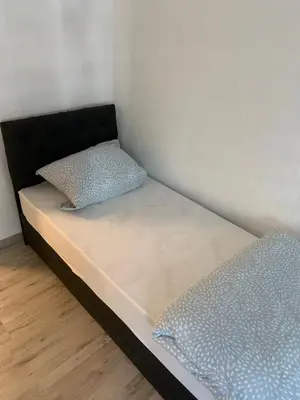 Ein Bett oder Betten in einem Zimmer der Unterkunft Unterkunft Mara