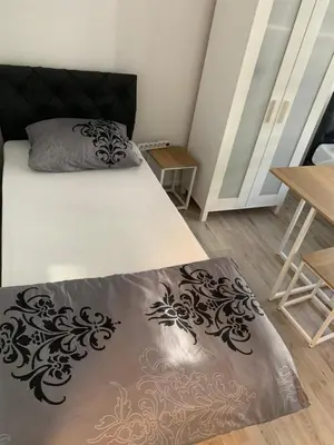 Ein Bett oder Betten in einem Zimmer der Unterkunft Unterkunft Mara