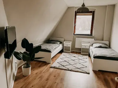 Ein Bett oder Betten in einem Zimmer der Unterkunft Ein Nachbar des Unesco-Weltkulturerbes Zeche Zollverein! GE2R