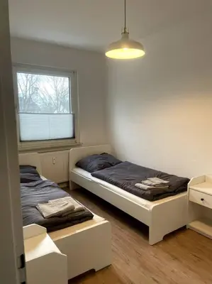 Ein Bett oder Betten in einem Zimmer der Unterkunft Zentral wohnen in ruhiger Lage! MA2R