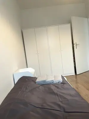 Ein Bett oder Betten in einem Zimmer der Unterkunft Zentral wohnen in ruhiger Lage! MA2R