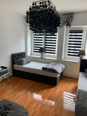 Ein Bett oder Betten in einem Zimmer der Unterkunft Unterkunft Ferienwohnung Mara Oberhausen