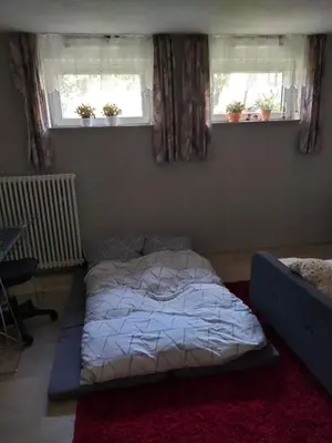 Ein Bett oder Betten in einem Zimmer der Unterkunft Ferienwohnung CoCo