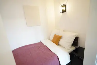Ein Bett oder Betten in einem Zimmer der Unterkunft Dein Flughafen Messe Appartment nahe Düsseldorf 1