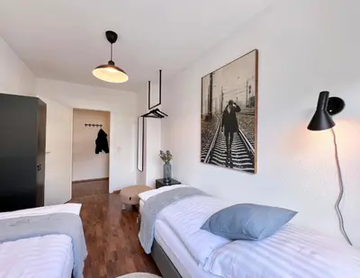Ein Bett oder Betten in einem Zimmer der Unterkunft SABE APARTMENT: BALCONY + FREE PARKING + NETFLIX