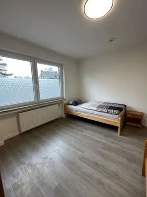 Ein Bett oder Betten in einem Zimmer der Unterkunft Oberhausen Apartments