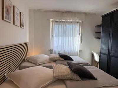 Ein Bett oder Betten in einem Zimmer der Unterkunft Relax Center Suite