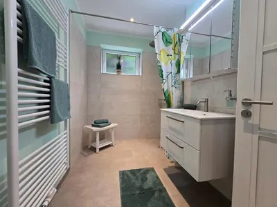 Ein Badezimmer in der Unterkunft HR Haus unter den Linden
