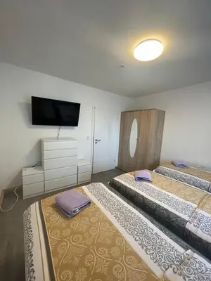 Ein Bett oder Betten in einem Zimmer der Unterkunft Monteurwohnung für 5 Personen, Marl