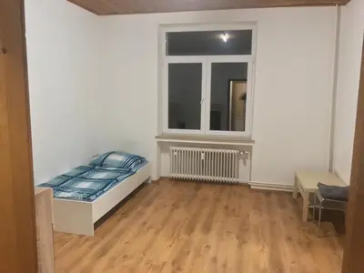 Ein Bett oder Betten in einem Zimmer der Unterkunft K&K Unterkunft GbR, Wohunung 3
