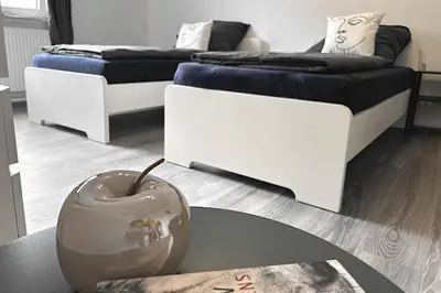 Ein Sitzbereich in der Unterkunft VAZ Apartments Haus Langerfeld für Monteure, TV, WLAN, Küche, nahe 3M und EDE