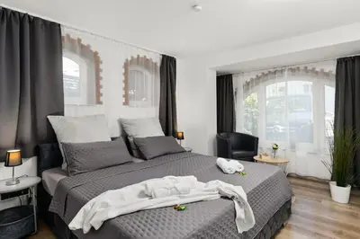 Ein Bett oder Betten in einem Zimmer der Unterkunft MOLA Apartments-Ferienwohnung für 5 Personen-separater Eingang-Gratis Parkplatz-Terrasse-Grill-Highspeed WLAN-auch für Langzeit geeignet